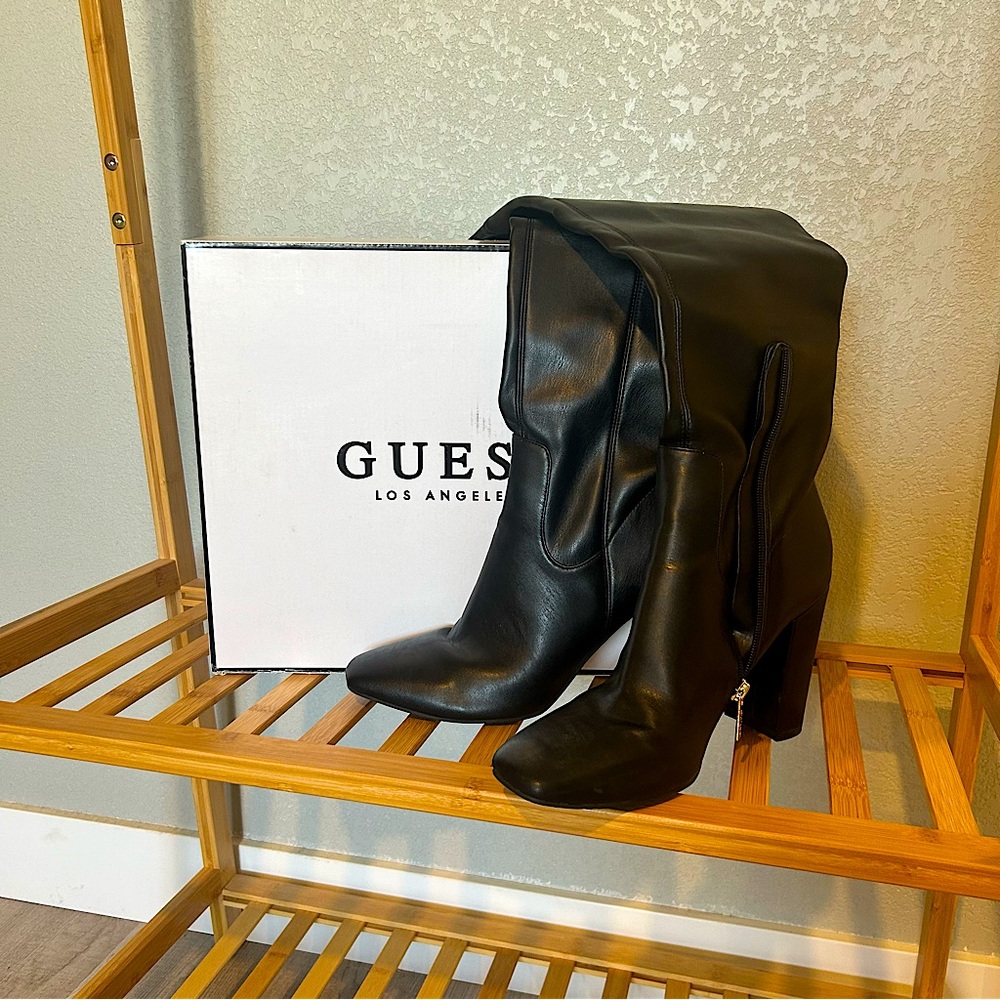 Guess knee-high leather boots. Never worn.
